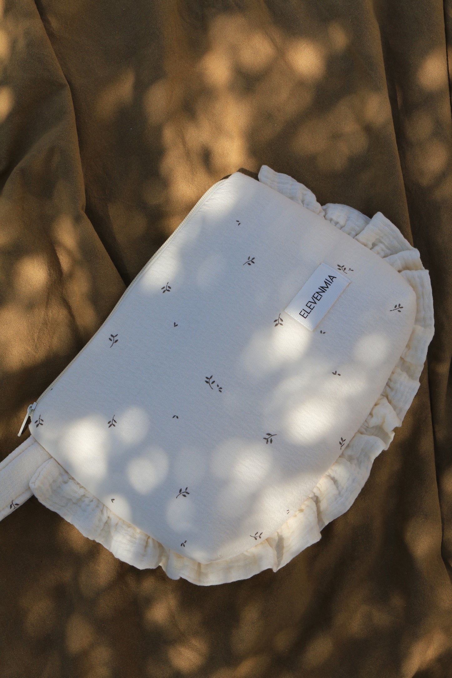 Trousse de toilette à volants imprimée nature