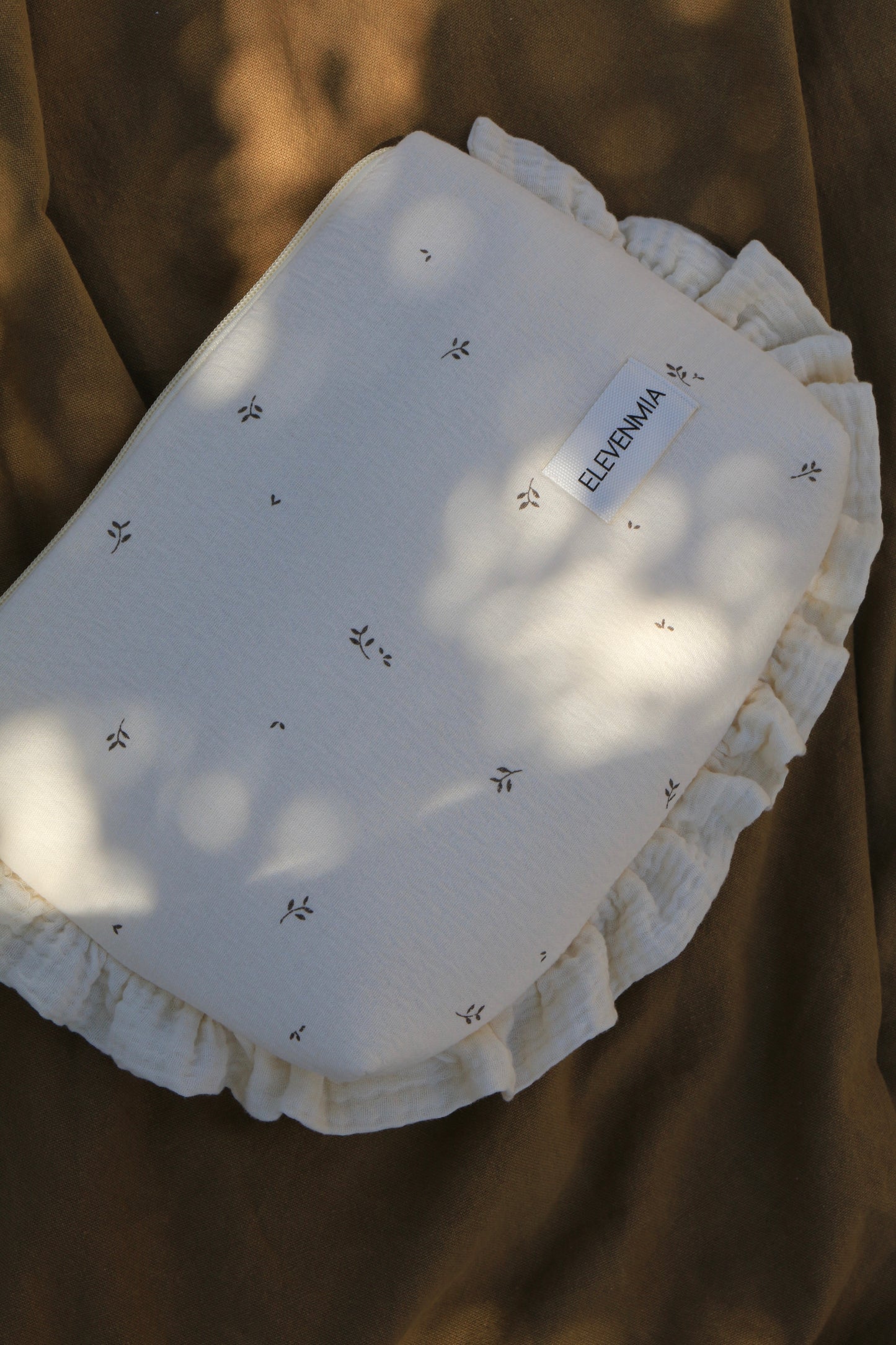 Trousse de toilette à volants imprimée nature