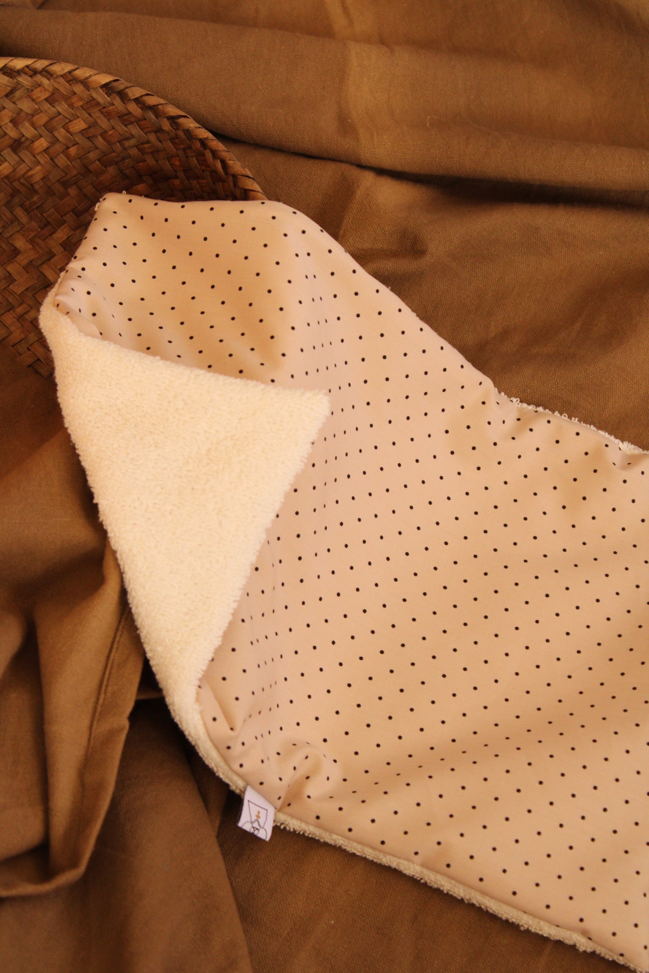 Protector de Toalla Dotty