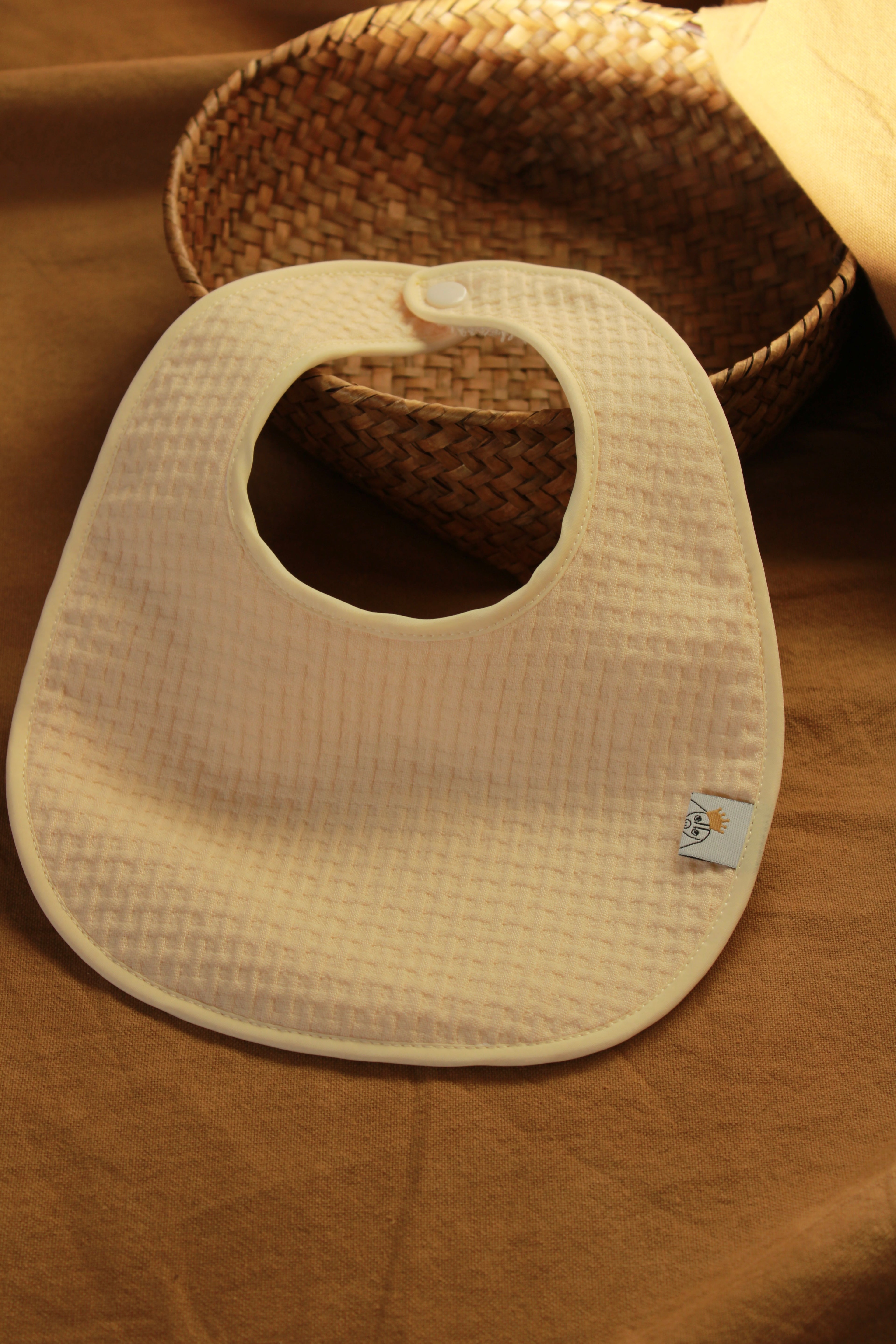 Bavoir Arpi rose + tissu éponge