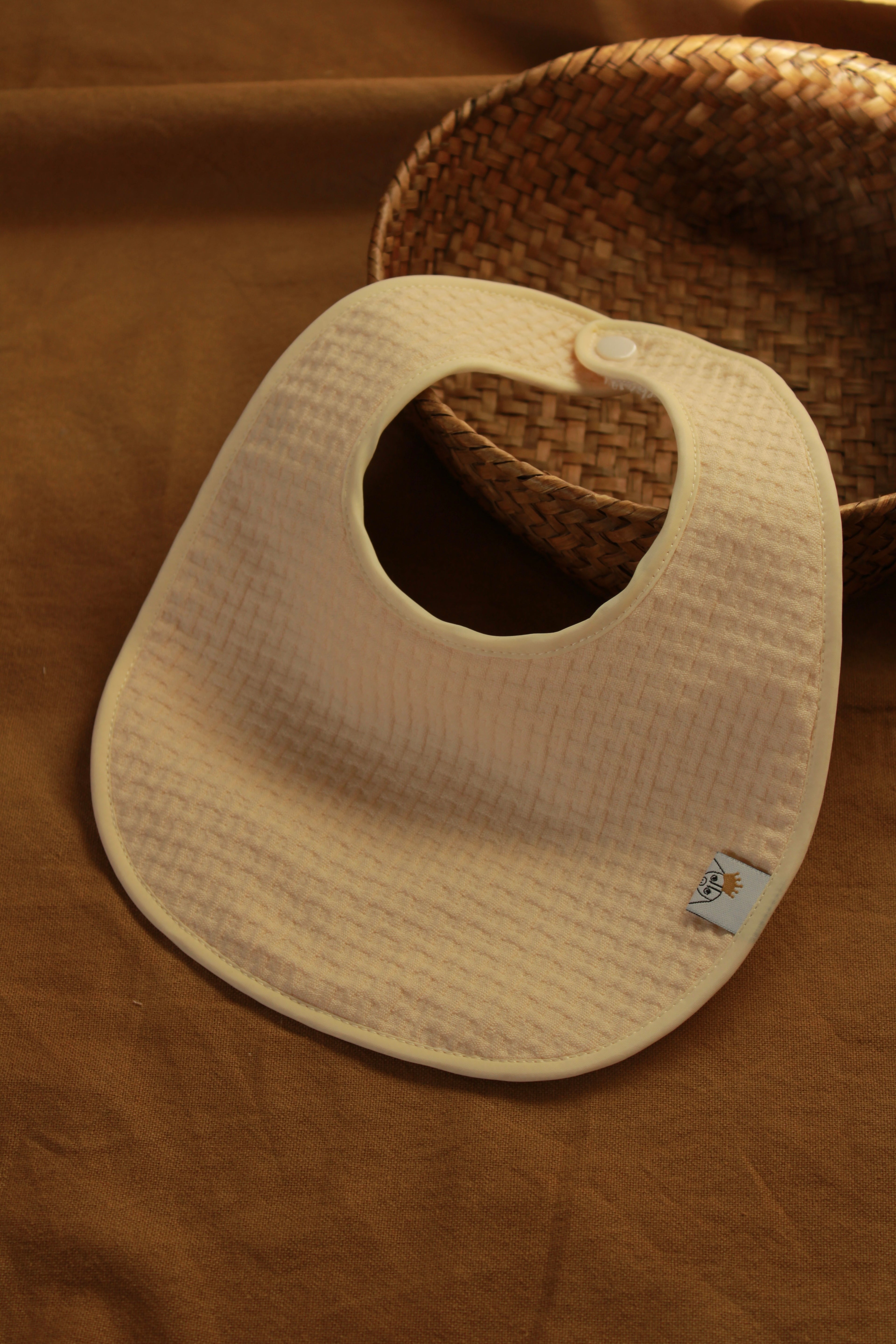 Bavoir Arpi rose + tissu éponge