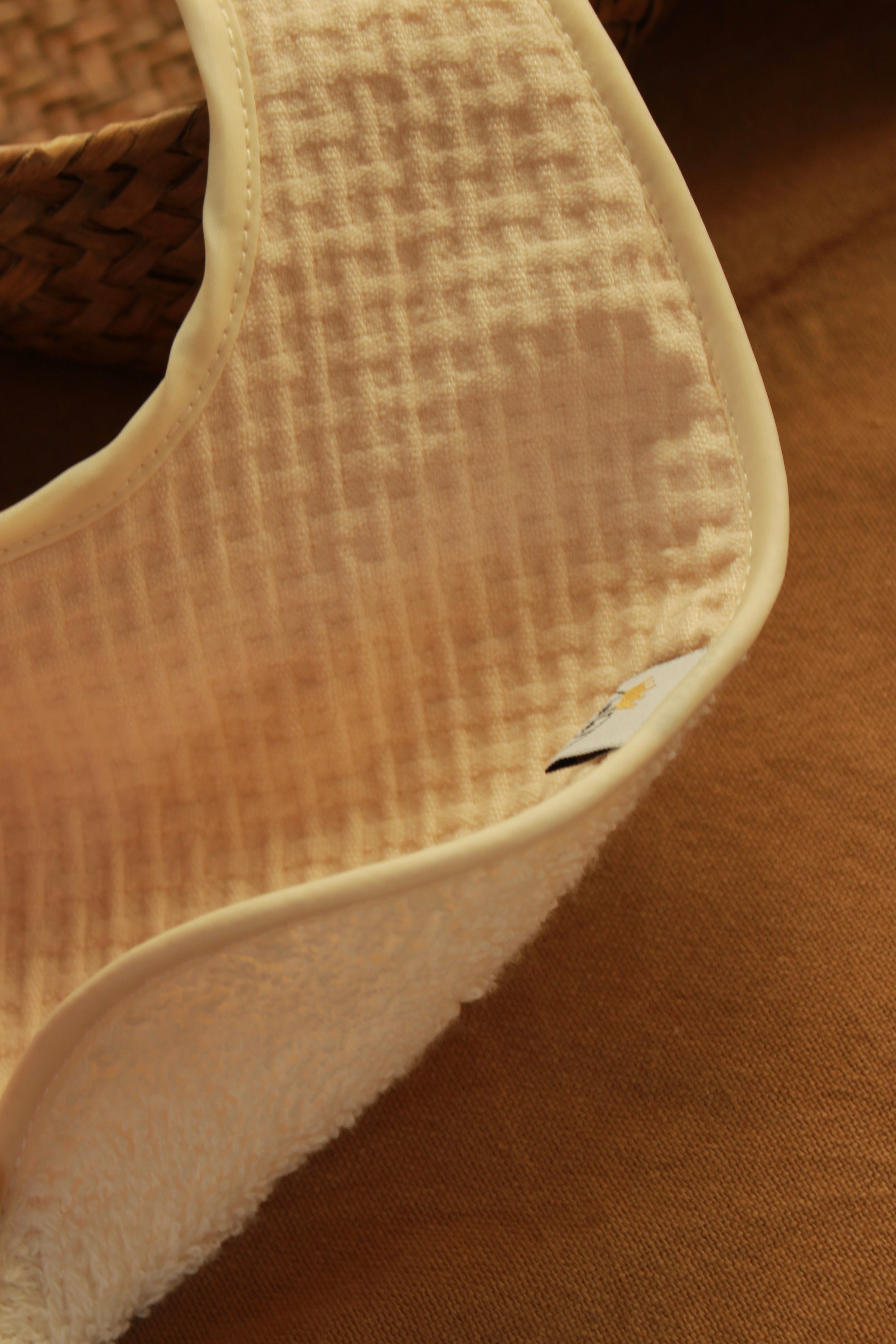 Bavoir Arpi rose + tissu éponge