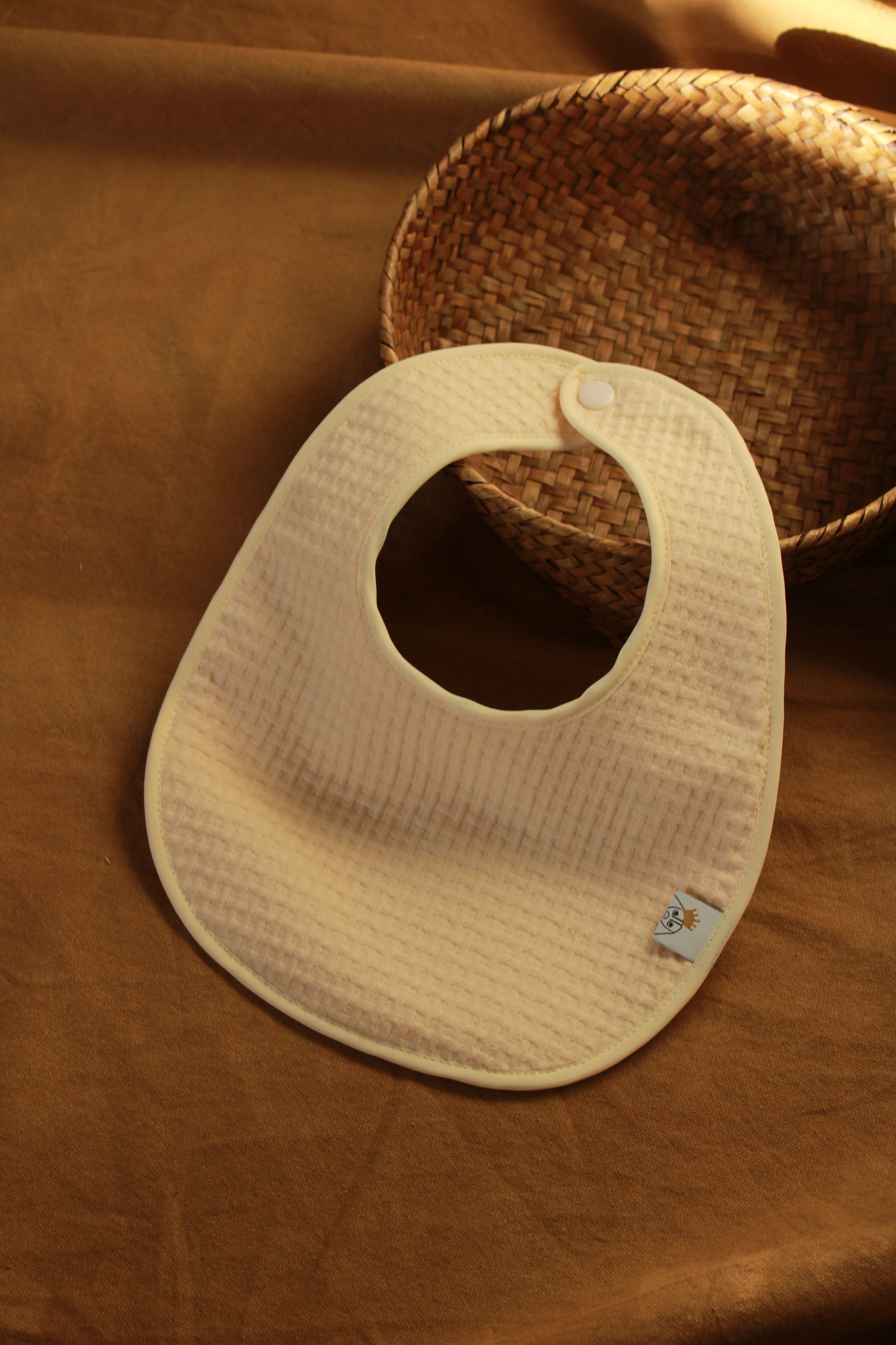 Bavoir Arpi rose + tissu éponge