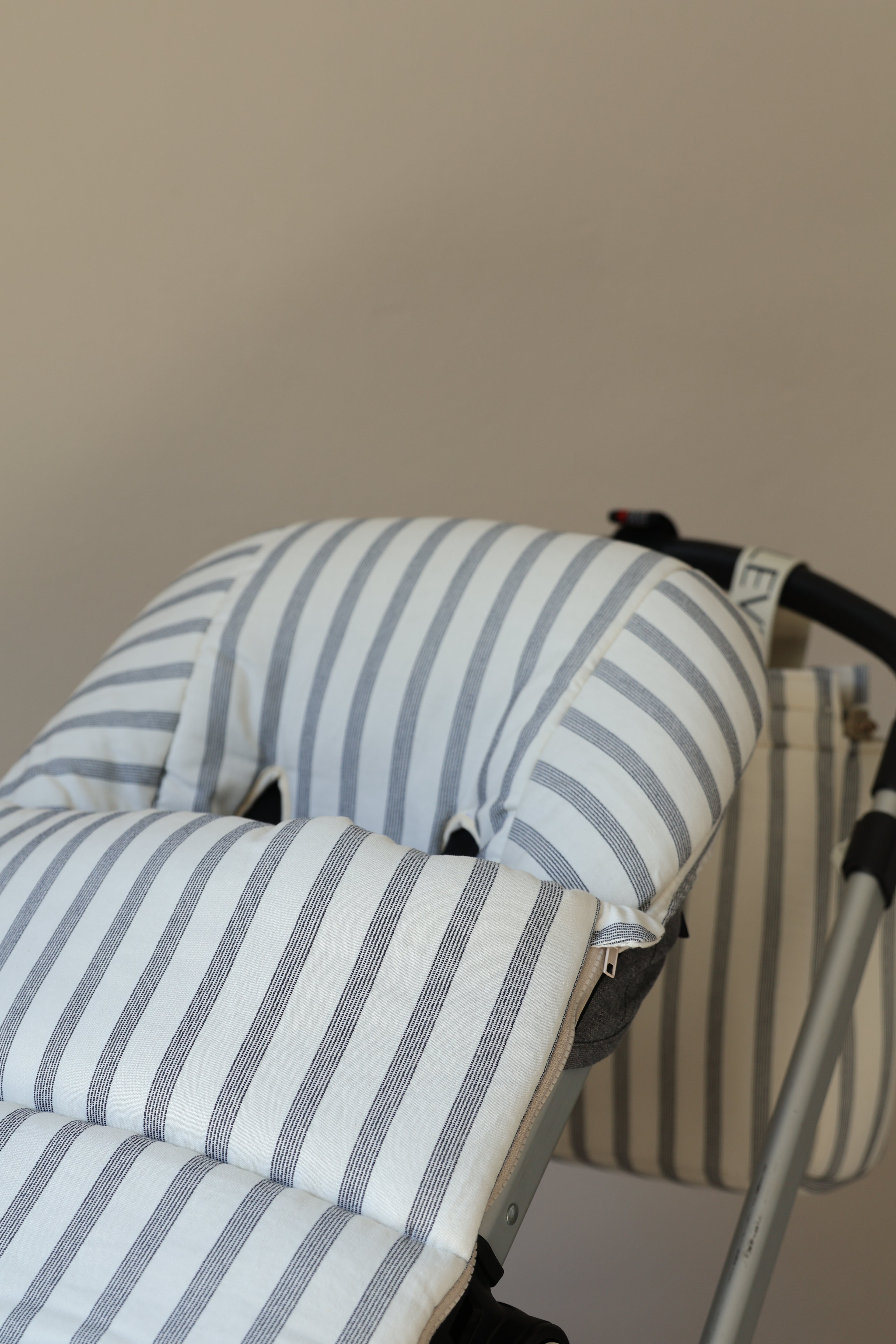 Sac de siège pour poussette Menorca