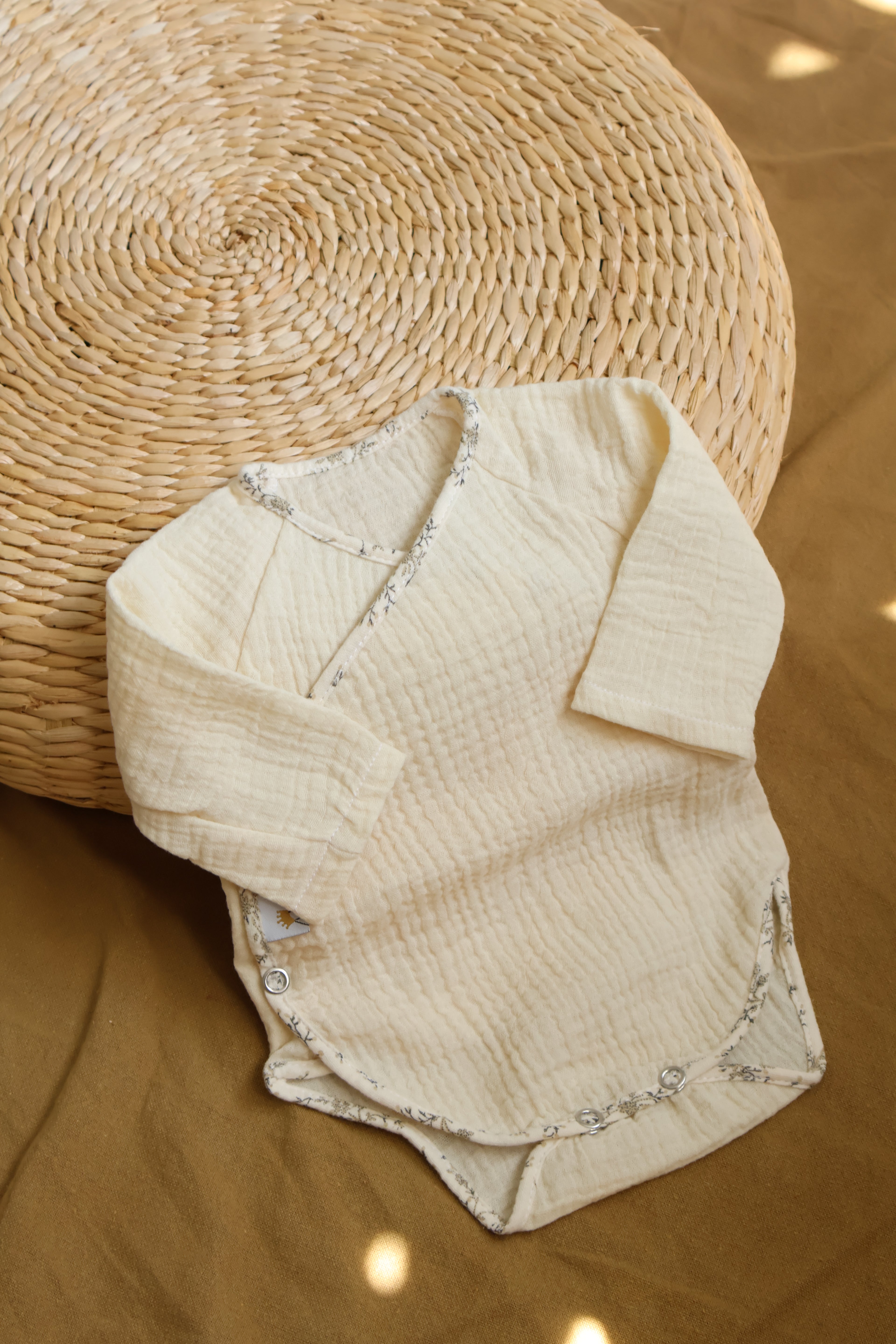 Body à manches longues en mousseline brute