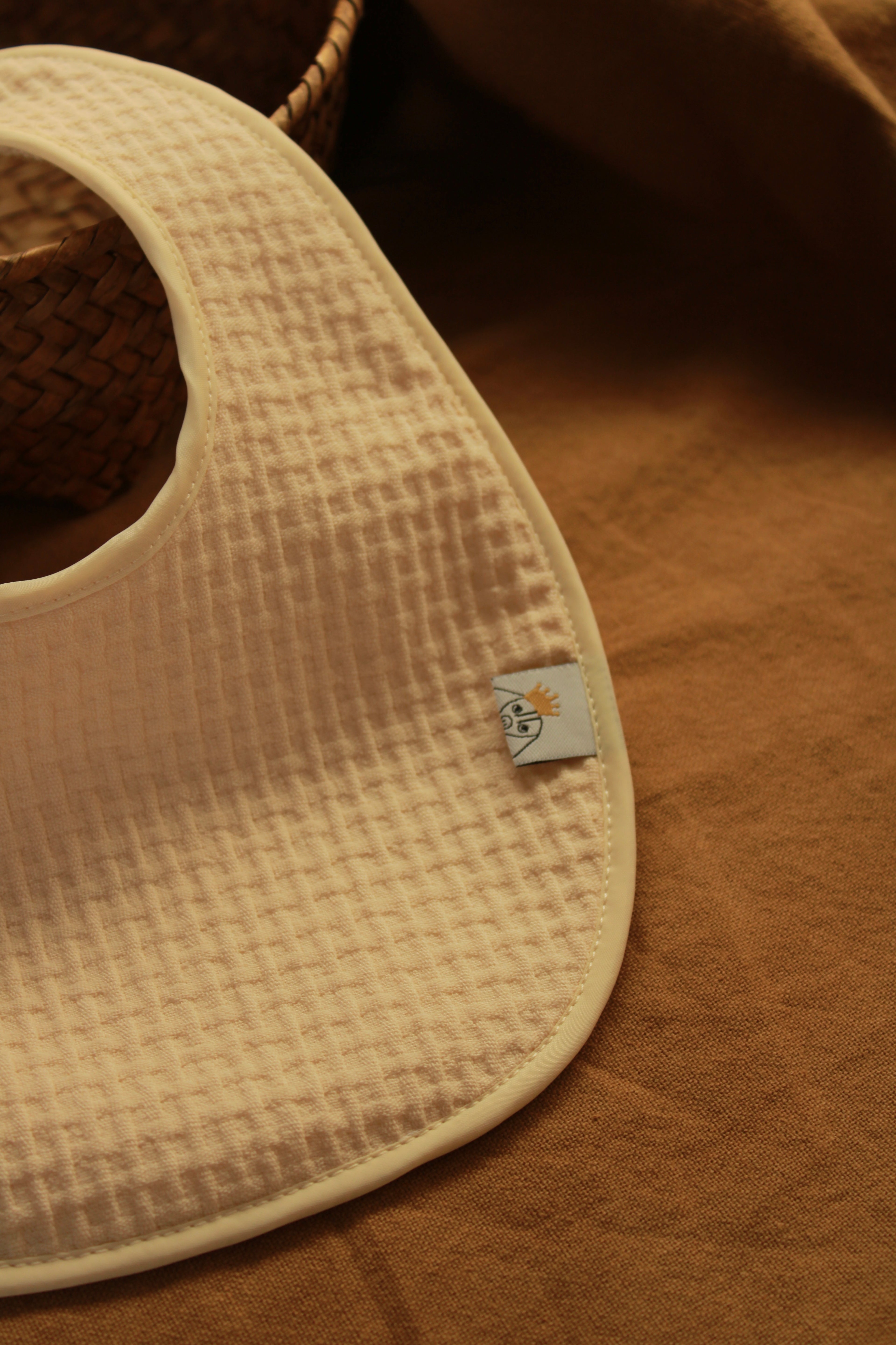 Bavoir Arpi rose + tissu éponge