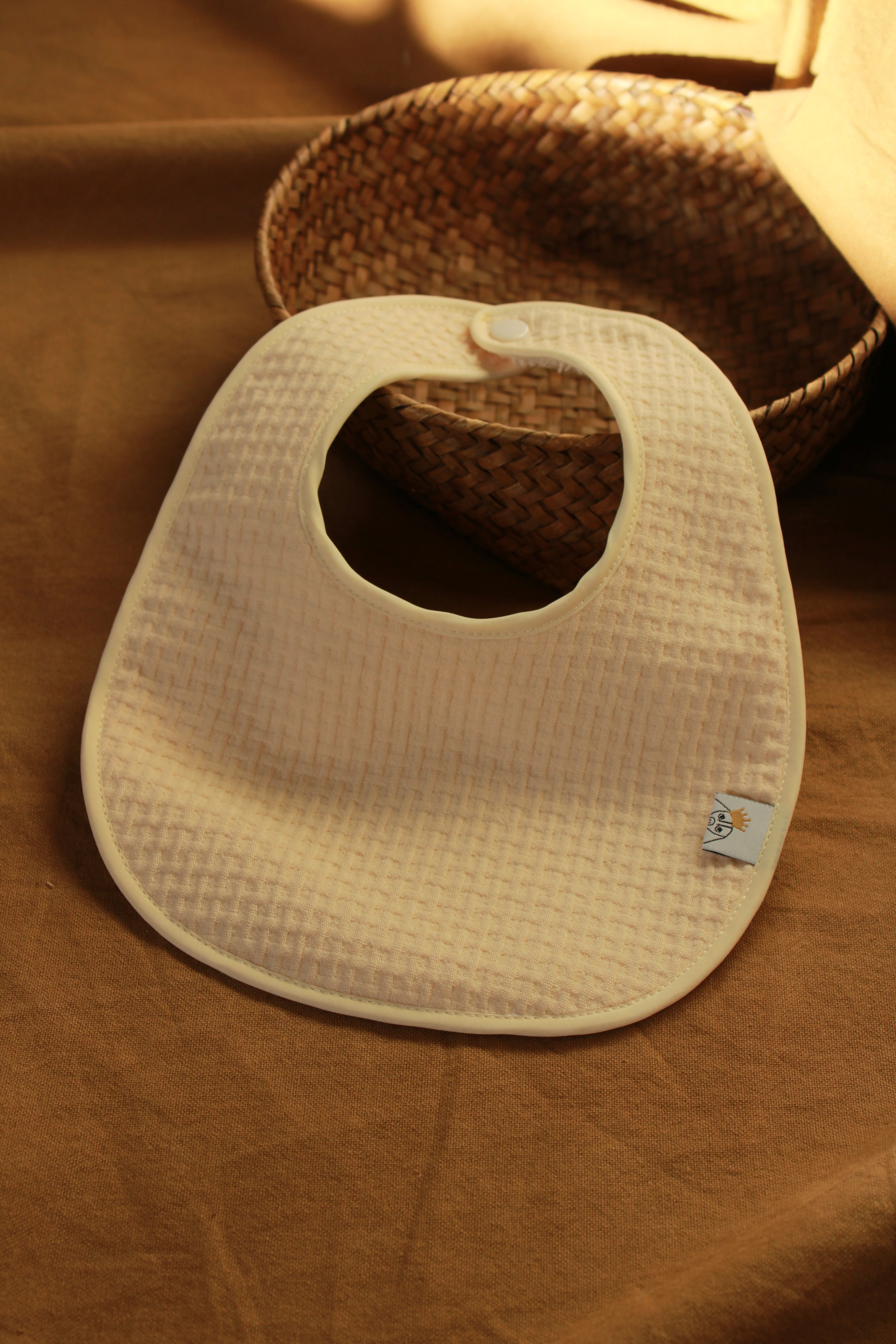 Bavoir Arpi rose + tissu éponge