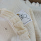 Beige Muslin + Mía Ruffle Cooing