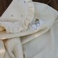 Beige Muslin + Mía Ruffle Cooing