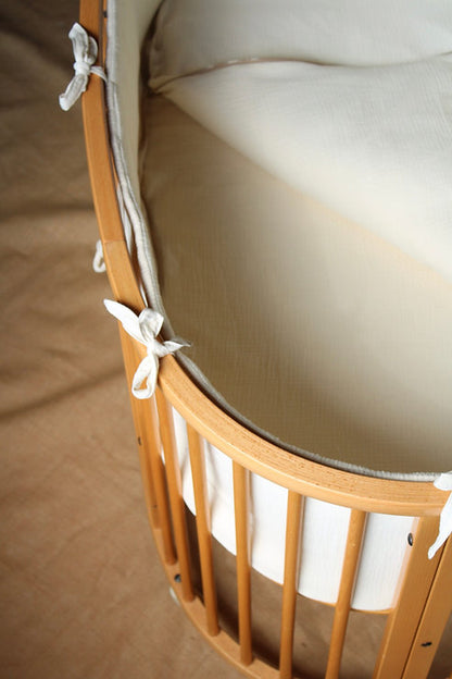 Beige Muslin Stokke Crib Protector